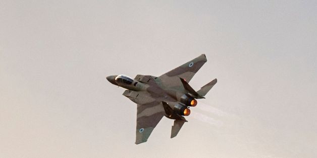 An Israeli F-15 fighter jet performs in an air show during the graduation ceremony of Israeli air force pilots at the Hatzerim base in the Negev desert, near the southern Israeli city of Beer Sheva, on December 29, 2016. / AFP / JACK GUEZ (Photo credit should read JACK GUEZ/AFP/Getty Images)