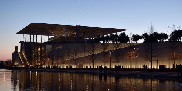 This picture taken on February 23, 2017, shows the national opera and library on sunset, during the delivery ceremony of the Stavros Niarchos Foundation Cultural Center to the Greek society.The SNFCC includes national opera, library and a park. / AFP / LOUISA GOULIAMAKI (Photo credit should read LOUISA GOULIAMAKI/AFP/Getty Images)