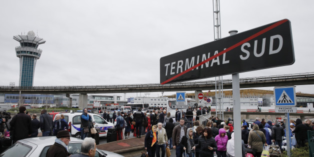 Repeating correcting date - Passengers wait at Orly airport southern terminal after a shooting incident near Paris, France March 18, 2017. REUTERS/Benoit Tessier