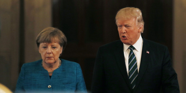 U.S. President Donald Trump and German Chancellor Angela Merkel arrive to give a joint news conference at the White House in Washington, U.S., March 17, 2017. REUTERS/Jim Bourg