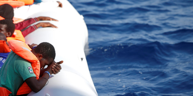 Migrants are seen during rescue operation in the Mediterranea Sea October 20, 2016. Yara Nardi/Italian Red Cross press office/Handout via Reuters ATTENTION EDITORS - THIS IMAGE WAS PROVIDED BY A THIRD PARTY. EDITORIAL USE ONLY.