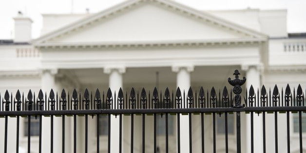 A security fence is seen around the perimeter of the White House in Washington, DC, March 18, 2017.A man who scaled a White House fence earlier this month traipsed the grounds of the executive residence for more than 16 minutes prior to his arrest, the US Secret Service said. / AFP PHOTO / SAUL LOEB (Photo credit should read SAUL LOEB/AFP/Getty Images)