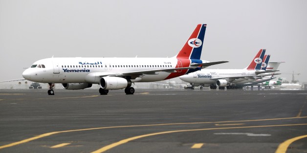 Planes belonging to the Yemen Airways, 'Yemeniya', are seen parked on the tarmac of the Sanaa International Airport in Sanaa, on March 28, 2015 after the third day of Saudi-led coalition airstrikes against Huthis. At least 200 UN staff and other expatriates were evacuated from the Yemeni capital, as an Arab coalition pressed a bombing campaign against Shiite rebels in the city, aid workers said. AFP PHOTO / MOHAMMED HUWAIS (Photo credit should read MOHAMMED HUWAIS/AFP/Getty Images)