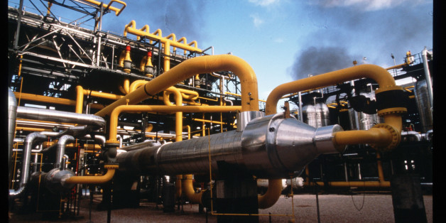 306260 34: Pipes carry oil at the southern complex refinery June 15, 1997 in Hassi Messaoud, Algeria. The recent completion of a multi-billion dollar oil refinery by the Japan Gas Corporation is part of a new effort by Algeria to open up its oil reserves to outside investors. (Photo by Scott Peterson/Liaison)