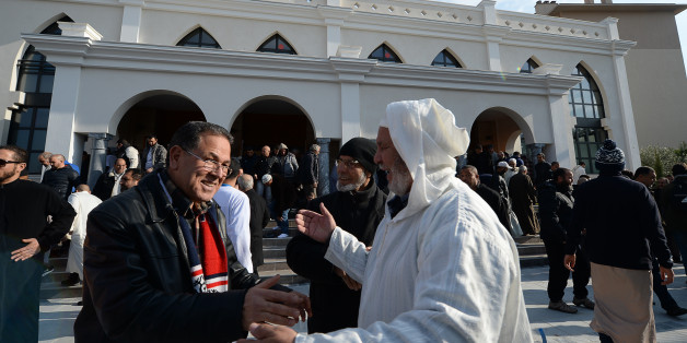People leave the mosque after the prayer in Frejus, on January 22, 2016, following the provisional authorisation for its reopening delivered by the prefecture. / AFP / BORIS HORVAT (Photo credit should read BORIS HORVAT/AFP/Getty Images)