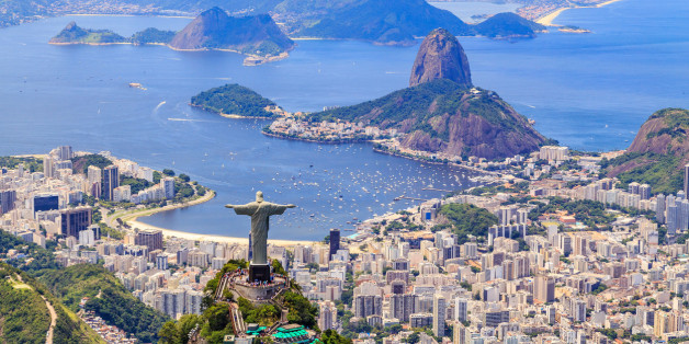 Aerial view of the Christ, The Redeemer Monument and the Corcovado Mountain in Rio de Janeiro, Brazil. One of the Seven Wonders of the World the monument is a must-go spot do travelers upon visiting Rio. Along with the beautiful statue the view of the Corcovado is breathtaking with the Sugarloaf Mountain and the Botafogo Bay among some of the places you can see from up there.