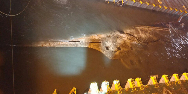 JINDO-GUN, SOUTH KOREA - MARCH 22: In this handout photo released by the South Korean Maritime Ministry, a submersible vessel attempts to salvage sunken Sewol ferry in waters off Jindo, on March 22, 2017 in Jindo-gun, South Korea. The Sewol sank off the Jindo Island in April 2014 leaving more than 300 people dead and nine of them still remain missing. The South Korean government attempted to raise the Sewol ferry on March 22, 2017. The Sewol sank off the Jindo Island in April 2014 leaving more