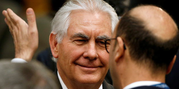U.S. Secretary of State Rex Tillerson speaks with a delegate during the afternoon ministerial plenary for the Global Coalition working to Defeat ISIS at the State Department in Washington, U.S., March 22, 2017. REUTERS/Joshua Roberts