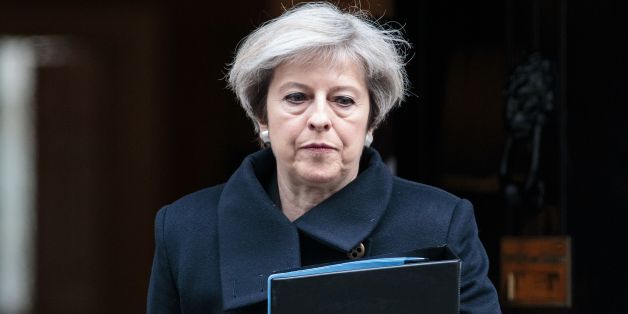 British Prime Minister Theresa May leaves 10 Downing Street in central London on March 23, 2017.
Britain's parliament reopened on Thursday with a minute's silence in a gesture of defiance a day after an attacker sowed terror in the heart of Westminster, killing three people before being shot dead. Sombre-looking lawmakers in a packed House of Commons chamber bowed their heads and police officers also marked the silence standing outside the headquarters of London's Metropolitan Police nearby.
/ AFP PHOTO / POOL / Jack Taylor (Photo credit should read JACK TAYLOR/AFP/Getty Images)