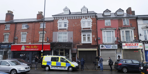 A police vehicle is parked ouside a property in that was raided after an attack by a man driving a car and weilding a knife in Westminster left five people dead and dozens injured, in Birmingham, Britain, March 23, 2017. REUTERS/Eddie Keogh