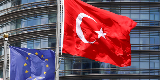 European Union (L) and Turkish flags fly outside a hotel in Istanbul, Turkey May 4, 2016. REUTERS/Murad Sezer/File Photo