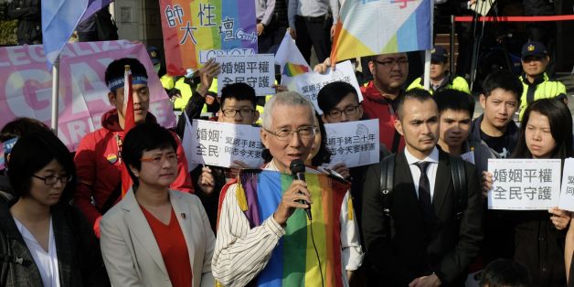 Veteran gay rights activist Chi Chia-wei (C) speaks to the press with his supporters in front of the Judicial Yuan in Taipei on March 24, 2017.Taiwan's constitutional court began hearing a landmark case on March 24 that could make the island the first place in Asia to allow same-sex marriage. / AFP PHOTO / SAM YEH (Photo credit should read SAM YEH/AFP/Getty Images)