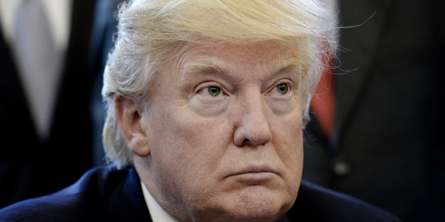 U.S. President Donald Trump listens during a National Economic Council meeting at the Oval Office in Washington, D.C., U.S., on Friday, March 27, 2017. House Republicans abandoned their efforts to repeal and partially replace Obamacare after Trump and Speaker Paul Ryan concluded they didn't have enough support, marking an embarrassing setback for the GOP agenda. Photographer: Olivier Douliery/Pool via Bloomberg
