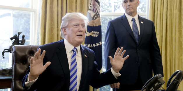 U.S. President Donald Trump, left, speaks to members of the media as U.S. Vice President Mike Pence stands at the Oval Office in Washington, D.C., U.S., on Friday, March 27, 2017. House Republicans abandoned their efforts to repeal and partially replace Obamacare after Trump and Speaker Paul Ryan concluded they didn't have enough support, marking an embarrassing setback for the GOP agenda. Photographer: Olivier Douliery/Pool via Bloomberg