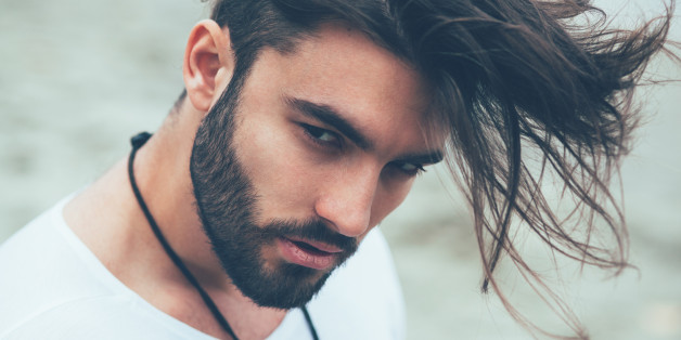 Portrait of a man with beard and modern hairstyle