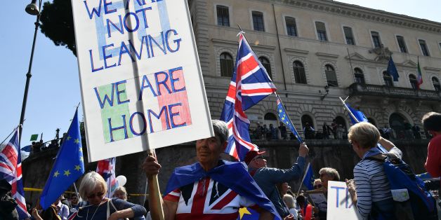 A man protests against 'Brexit' and holds a placard reading 'we will always be European' during a pro-Europe demonstration (European federalist movement) on March 25, 2017 in Rome. Italian capital hosts a special summit of European leaders today to mark the 60th anniversary of the bloc's founding treaties. / AFP PHOTO / Vincenzo PINTO (Photo credit should read VINCENZO PINTO/AFP/Getty Images)