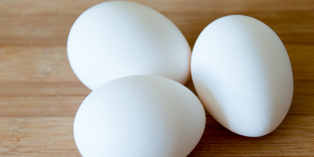 TORONTO, ONTARIO, CANADA - 2015/03/30: Eggs: realistic approach to food ingredients. Three white eggs over a wooden surface or cutting board in a kitchen, some shallow depth of field and natural lightning. (Photo by Roberto Machado Noa/LightRocket via Getty Images)