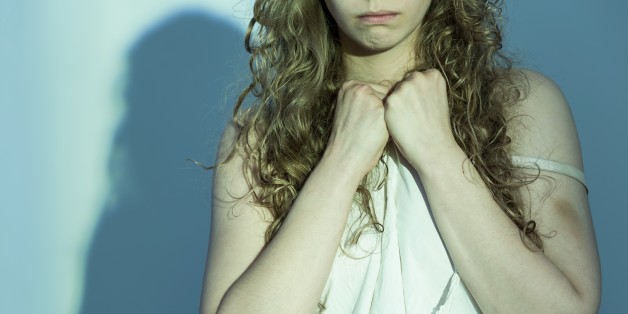 Close-up of young female victim of rape