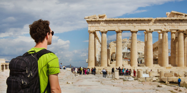 tourist looking at Parthenon, Acropolis ruin, Athens, Greece