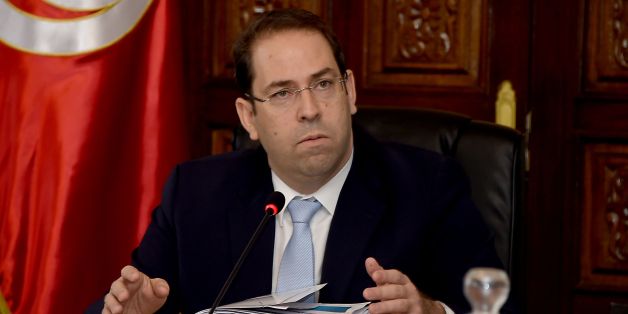 Tunisian Prime minister Youssef Chahed chairs a council of ministers meeting with his cabinet in Tunis on December 30, 2016.
Chahed announced all jihadists returning from foreign battlefields would be immediately arrested and judged according to the country's counter-terrorism law.
/ AFP / FETHI BELAID (Photo credit should read FETHI BELAID/AFP/Getty Images)