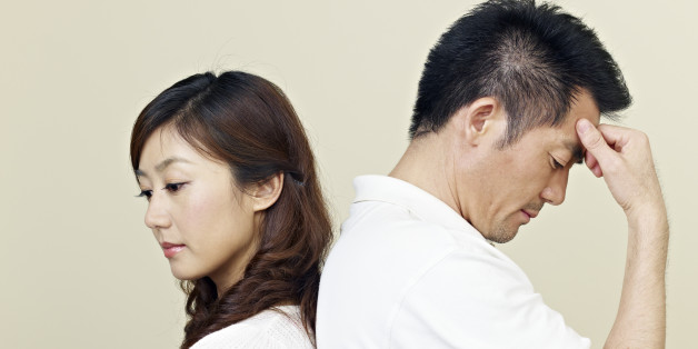 young asian couple having relationship difficulties.