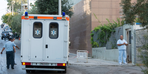 A member of the council comes straight from the hospital at the building of the General Secretariat of Information and Communications Greece, Athens, 30 August 2016 . The auction will begin at 9am and it is estimated that about a twelve hours will be required for each licence. The starting price has been set at EUR 3 mln and will increase by EUR 500,000 at the beginning of the auctioning. Then the committee will increase the price down to the final two candidates, who will deliver their offers in sealed envelopes and the license will be awarded to the highest bidder. The competition may last for days, during which candidates should stay awake and manage millions of euros to reclaim a television license. (Photo by Dimitris Lampropoulos/NurPhoto via Getty Images)