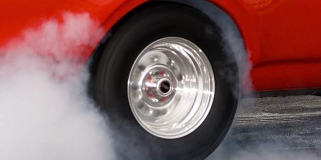 Oldmobile Cutlass Supreme getting ready to drag race.Other similar images....