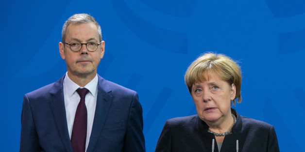 Angela Merkel, Germany's chancellor, center, speaks as Peter Bofinger, economist and member of the German council of economic advisers, left, and Christoph Schmidt, chairman of the German council of economic advisers, look on as the German government's council of economic advisers delivers its report at the Chancellery in Berlin, Germany, on Wednesday, Nov. 2, 2016. The European Union's balance of power will shift against its more market-oriented members if the U.K. drops out, the German government's council of economic advisers said, calling for 'constructive negotiations' to keep Britain in the EU despite the Brexit referendum. Photographer: Krisztian Bocsi/Bloomberg via Getty Images