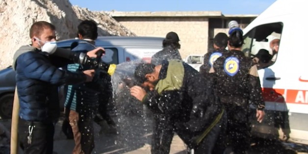 reduce the effectIDLIB, SYRIA - APRIL 4: Civil defense members try to reduce the effects of chlorine gas with water as they carry out search and rescue works after Assad Regime forces's attack with chlorine gas to Khan Shaykhun town of Idlib, Syria on April 4, 2017.
(Photo by Firas Faham/Anadolu Agency/Getty Images)