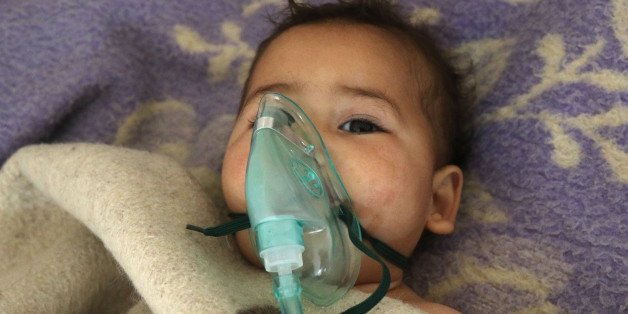 A Syrian child receives treatment following a suspected toxic gas attack in Khan Sheikhun, a rebel-held town in the northwestern Syrian Idlib province, on April 4, 2017.Warplanes carried out a suspected toxic gas attack that killed at least 35 people including several children, a monitoring group said. The Syrian Observatory for Human Rights said those killed in the town of Khan Sheikhun, in Idlib province, had died from the effects of the gas, adding that dozens more suffered respiratory proble