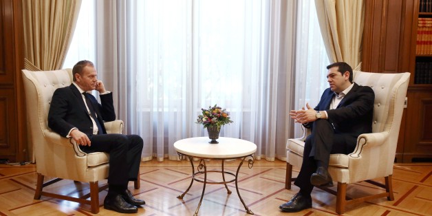 Greek Prime Minister Alexis Tsipas (R) talks with EU President Donald Tusk in his office at Maximos mansion on March 3, 2016 in Athens, for talks on the migrant crisis, after the bloc proposed 700 million euros in emergency aid for Greece and other states to help them manage the influx at their borders. / AFP / Panagiotis TZAMAROS (Photo credit should read PANAGIOTIS TZAMAROS/AFP/Getty Images)