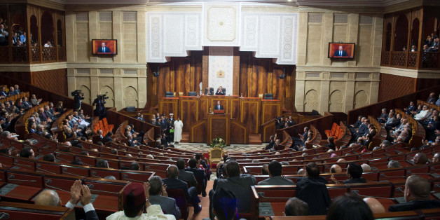French President Francois Hollande (C) delivers a speech at the Moroccan Parliament in Rabat, April 4, 2013. Hollande is on an official two-day visit to Morocco. REUTERS/Bertrand Langlois/Pool (MOROCCO - Tags: POLITICS)