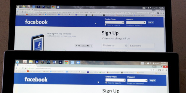 Computer screens display the Facebook sign-in screen in this photo illustration taken in Golden, Colorado, United States July 28, 2015. REUTERS/Rick Wilking/File Photo