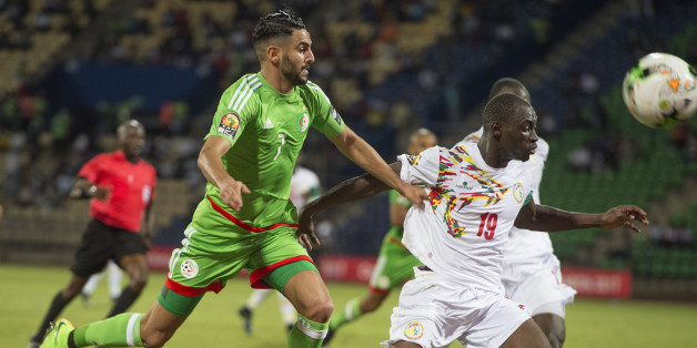 FRANCEVILLE, GABON - JANUARY 23: RIYAD KARIM MAHREZ of Algeria and SALIOU CISS of Senegal during the Group B match between Senegal and Algeria at Stade Franceville on January 23, 2017 in Franceville, Gabon. (Photo by Visionhaus/Corbis via Getty Images)