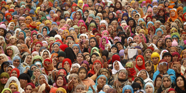 Kashmiri Muslim women watch a relic of Prophet Mohammad being displayed during the festival of Eid-e-Milad at Hazratbal shrine in Srinagar February 16, 2011. Thousands of Kashmiri Muslims on Wednesday thronged to the shrine of Hazratbal, which houses a relic believed to be a hair from the beard of Prophet Mohammad, to celebrate Eid-e-Milad or the Prophet's birth anniversary. REUTERS/Fayaz Kabli (INDIAN-ADMINISTERED KASHMIR - Tags: ANNIVERSARY RELIGION IMAGES OF THE DAY)