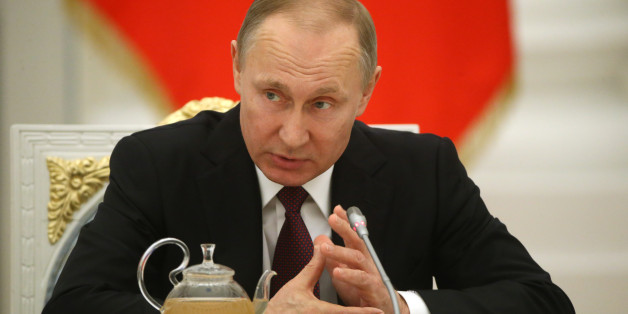 MOSCOW, RUSSIA - FEBRUARY 23: (RUSSIA OUT) Russian President Vladimir Putin speaks during his meeting with naval officers and jet and bomber pilots who took part in the military operation in Syria, at the Kremlin on February 23, 2017 in Moscow, Russia. (Photo by Mikhail Svetlov/Getty Images)