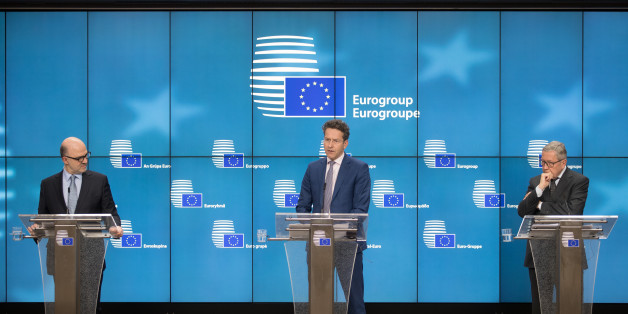 Pierre Moscovici, economic commissioner for the European Union (EU), from left, Jeroen Dijsselbloem, Dutch finance minister and head of the group of euro-area finance ministers, and Klaus Regling, managing director of the European Stability Mechanism, participate in a news conference following a Eurogroup meeting of finance ministers in Brussels, Belgium, on Monday, March 20, 2017. Wolfgang Schaeuble, Germany's finance minister, said to reporters ahead of the meeting of euro-area finance ministe