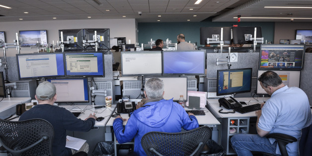 Traders work at the new Nasdaq Inc. trading floor of the Philadelphia Stock Exchange (PHLX) inside FMC Tower in Philadelphia, Pennsylvania, U.S., on Monday, April 3, 2017. Nasdaq moved their office eight blocks into a 75,000 square feet section of the newly constructed FMC Tower. Photographer: Charles Mostoller/Bloomberg via Getty Images