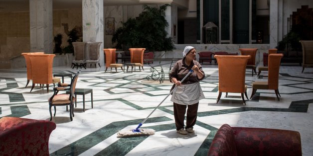 SOUSSE, TUNISIA - JUNE 24: An employee mops the lobby floor at the closed Imperial Marhaba Hotel on June 24, 2016 in Sousse, Tunisia. The Imperial Marhaba hotel was the main target of the 2015 Sousse beach terrorist attack that killed 38 people including 30 Britons. The hotel attempted to stay open for three months after the attacks, however low occupancy forced the hotel to close. Since then it has operated with a skeleton staff, who work to maintain the rooms and grounds, other permanent hote