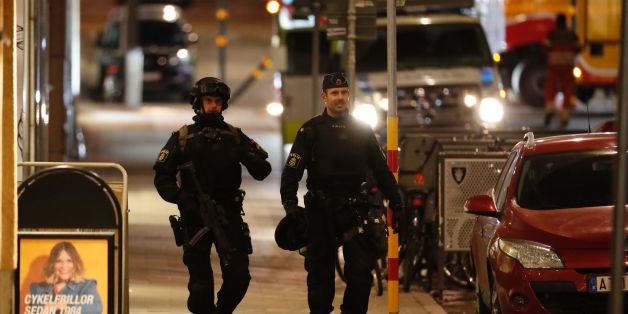 Swedish police officers patrol on April 8, 2017, the area where a stolen truck was driven through a crowd outside a department in Stockholm on April 7, 2017.
A massive manhunt was underway for the driver of the stolen truck that ploughed into the crowd, killing four and injuring 15, Swedish police said. / AFP PHOTO / Odd ANDERSEN (Photo credit should read ODD ANDERSEN/AFP/Getty Images)