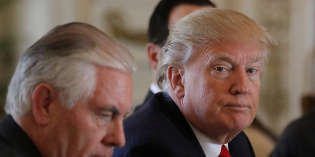 U.S. President Donald Trump (R) sits next to Secretary of State Rex Tillerson during a bilateral meeting with China's President Xi Jinping (Not Pictured) at Trump's Mar-a-Lago estate in Palm Beach, Florida, U.S., April 7, 2017.