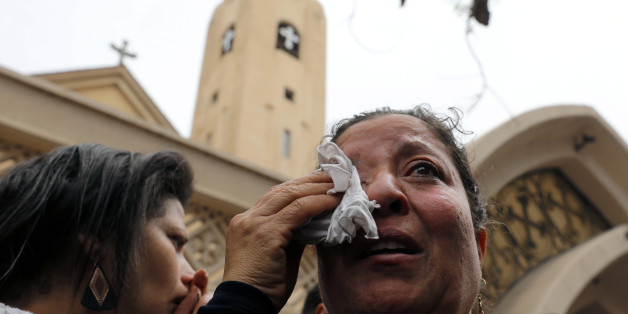A relative of one of the victims reacts after a church explosion killed at least 21 in Tanta, Egypt, April 9, 2017. REUTERS/Mohamed Abd El Ghany