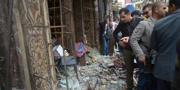 ATTENTION EDITORS - VISUALS COVERAGE OF SCENES OF DEATH AND INJURY Egyptians look at victims after suicide bomber in front of a church in Alexandria, Egypt, April 9, 2017. REUTERS/Fawzy Abdel Hamied TEMPLATE OUT.
