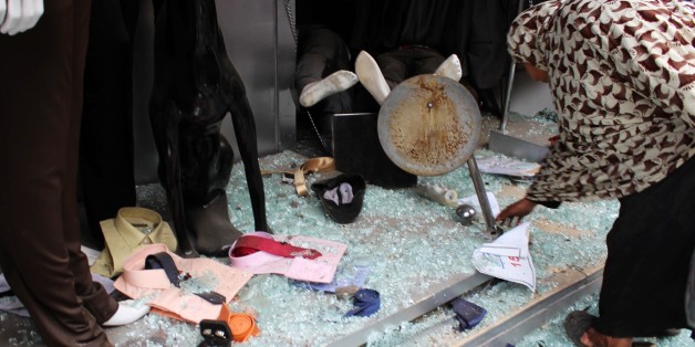 ALEXANDRIA, EGYPT - APRIL 09 : A shop window is seen after a bomb attack near St. Marks Cathedral in the coastal city of Alexandria, Egypt on April 09, 2017. At least 40 people were killed and scores injured in two church bombings claimed by Daesh terrorist group in Egypt as worshippers were marking Palm Sunday. (Photo by Ahmed Abd Alkawey/Anadolu Agency/Getty Images)