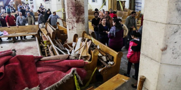 TANTA, EGYPT - APRIL 9: People are seen at the damaged Saint George church after a bombing struck inside the church in the Nile Delta city of Tanta, Egypt on April 9, 2017. At least 21 people were killed. (Photo by Ibrahim Ramadan/Anadolu Agency/Getty Images)