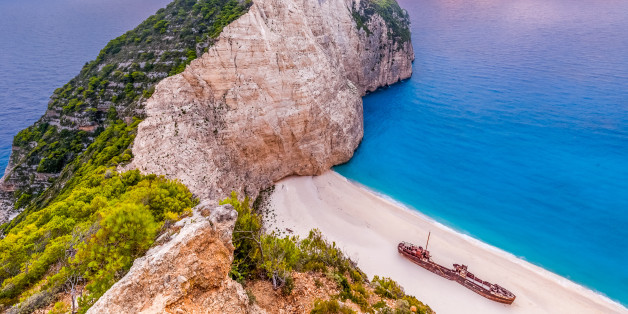 Sunset at Navagio beach with shipwreck view, Zakynthos, Greece