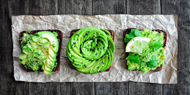 Fresh avocado toasts with alfalfa sprouts & cilantro