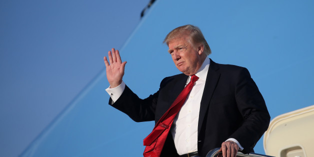 U.S. President Donald Trump waves as he arrives at Joint Base Andrews, Maryland, U.S., April 9, 2017. REUTERS/Carlos Barria