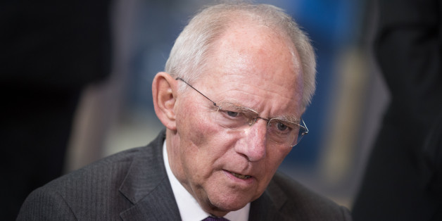 Wolfgang Schaeuble, Germany's finance minister, speaks to reporters as he arrives for a Eurogroup meeting of finance ministers in Brussels, Belgium, on Monday, March 20, 2017. Wolfgang Schaeuble, Germany's finance minister, said to reporters ahead of the meeting of euro-area finance ministers Well get a report on Greece, but the mission isnt completed,. Photographer: Jasper Juinen/Bloomberg via Getty Images