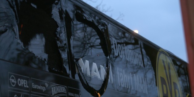DORTMUND, GERMANY - APRIL 11 : The bus of Borussia Dortmund stands after explosions at the hotel L'Arrivee in Germany on April 11, 2017. The UEFA Champions League quarter-final soccer match between Borussia Dortmund and AS Monaco has been postponed after an explosions near the bus carrying the Dortmund team, injuring one player. (Photo by INA FASSBENDER/Anadolu Agency/Getty Images)